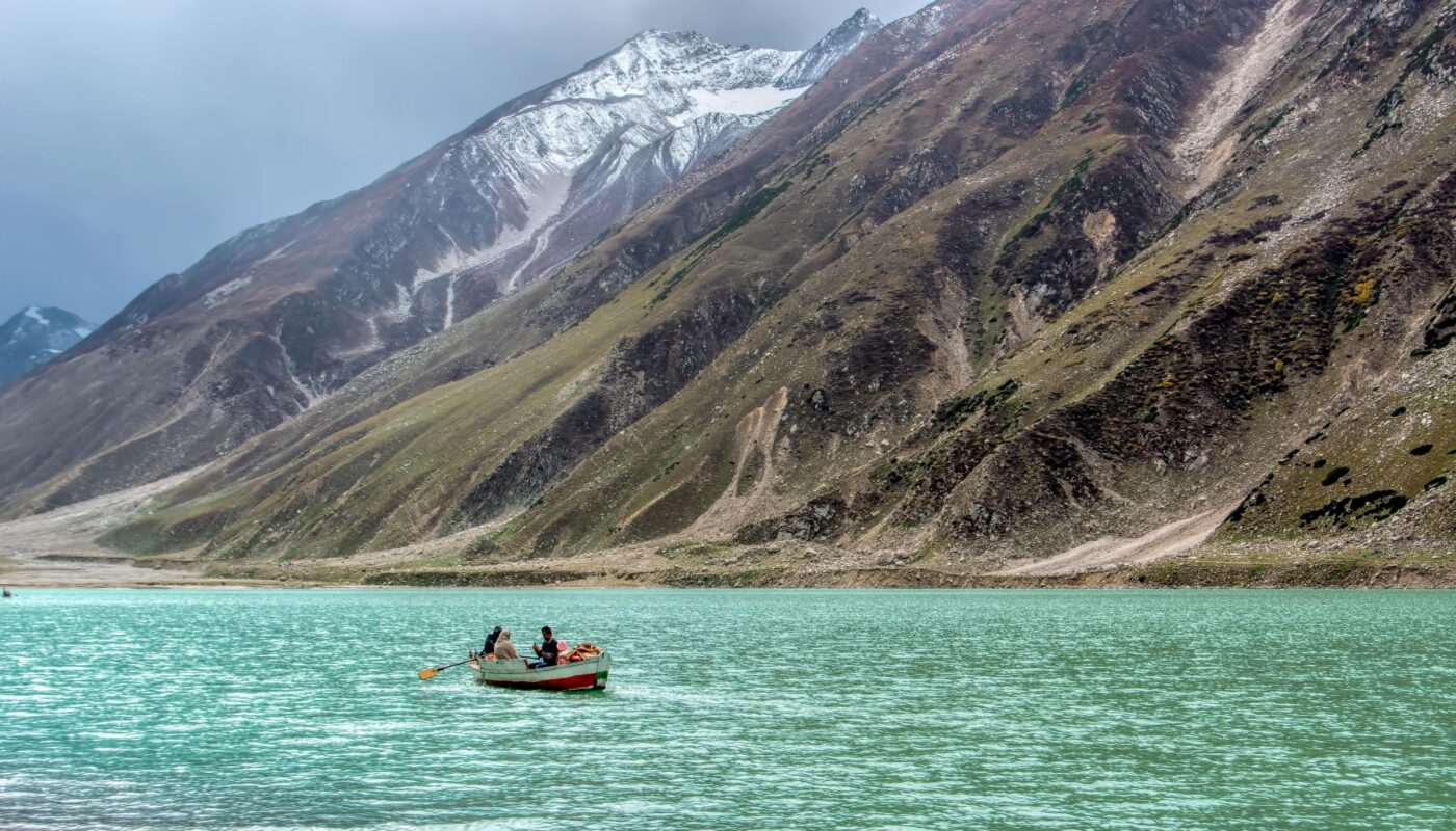 https://www.pexels.com/photo/people-riding-a-boat-in-a-lake-10811517/