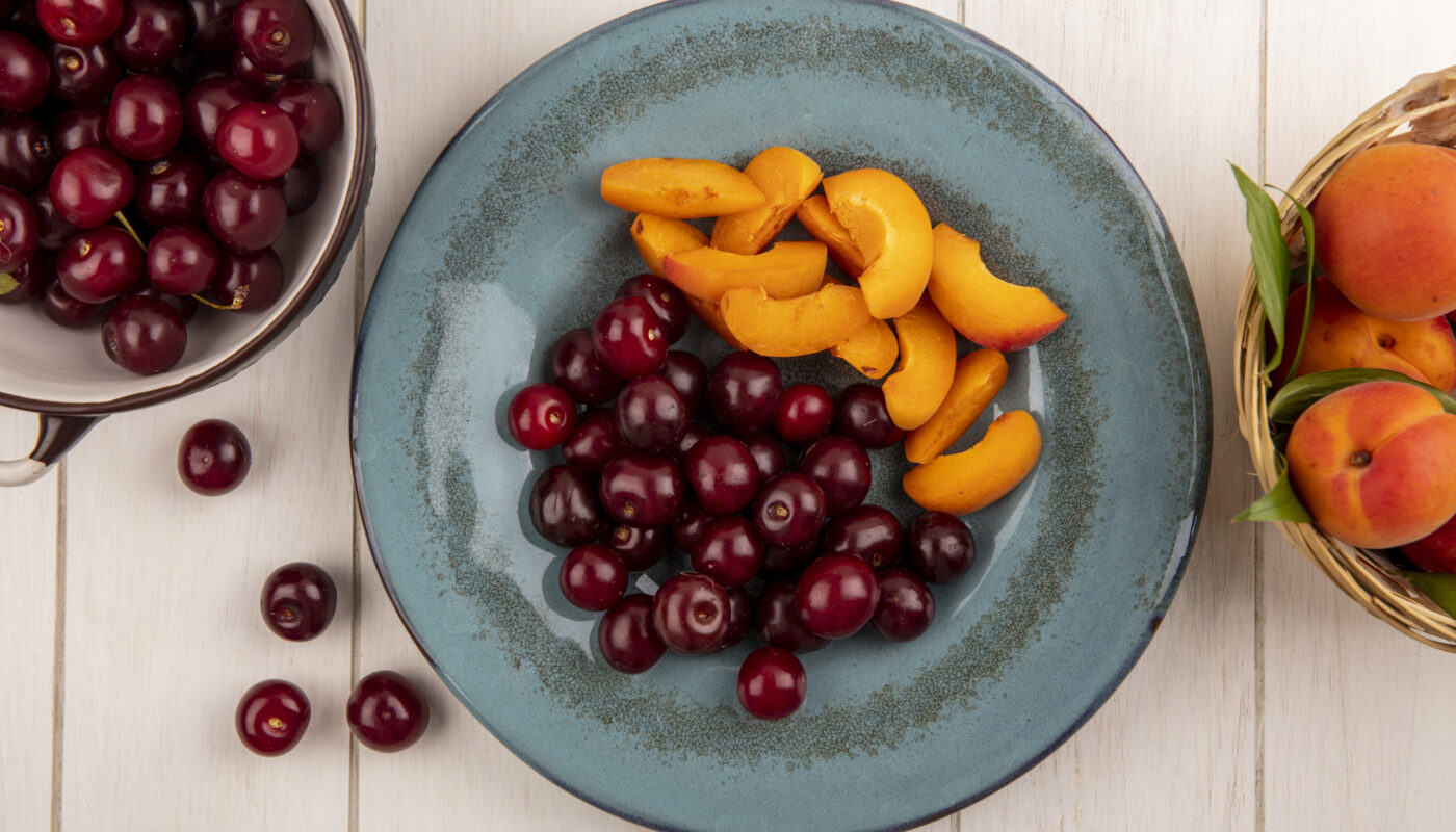 https://www.freepik.com/free-photo/top-view-fruits-as-cherries-apricot-slices-plate-basket-apricots-with-bowl-cherries-wooden-background_10428949.htm#fromView=search&page=3&position=24&uuid=5b160f79-d05f-48f3-b2dc-b60f7b0f4e8d&query=Hunza%E2%80%99s+Apricot+Dishes%3A+Exploring+the+Valley%E2%80%99s+Healthy+and+Delicious+Cuisine