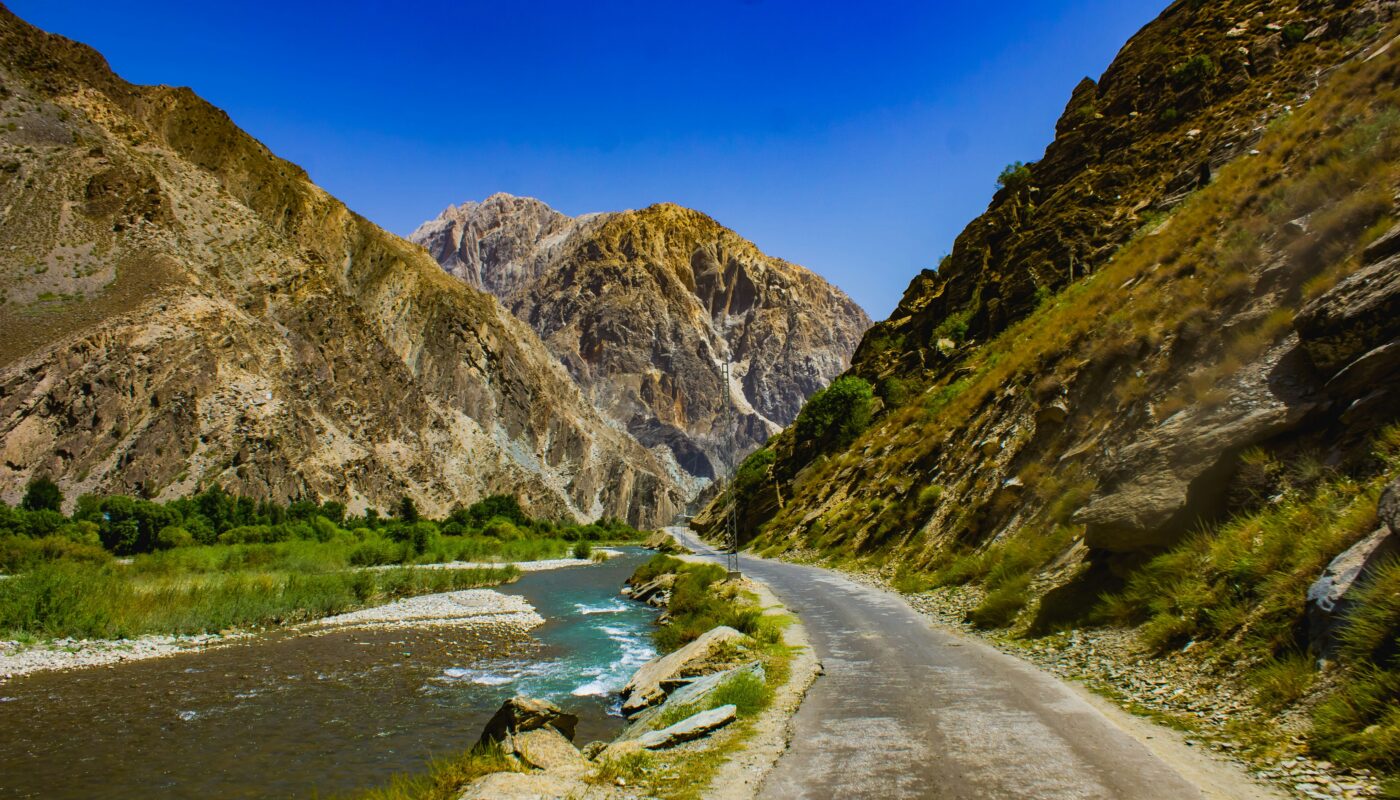 https://unsplash.com/photos/green-and-brown-mountain-beside-river-under-blue-sky-during-daytime-8pn4XEIGtX8